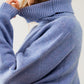 Loose blue sweater with dropped sleeves