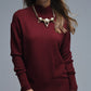 Loose burgundy sweater with open back detail