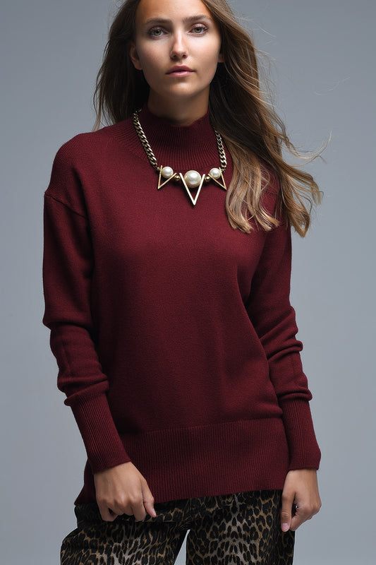 Loose burgundy sweater with open back detail