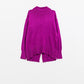 Q2 Loose fuchsia sweater with open back detail