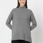 Loose gray sweater with open back detail