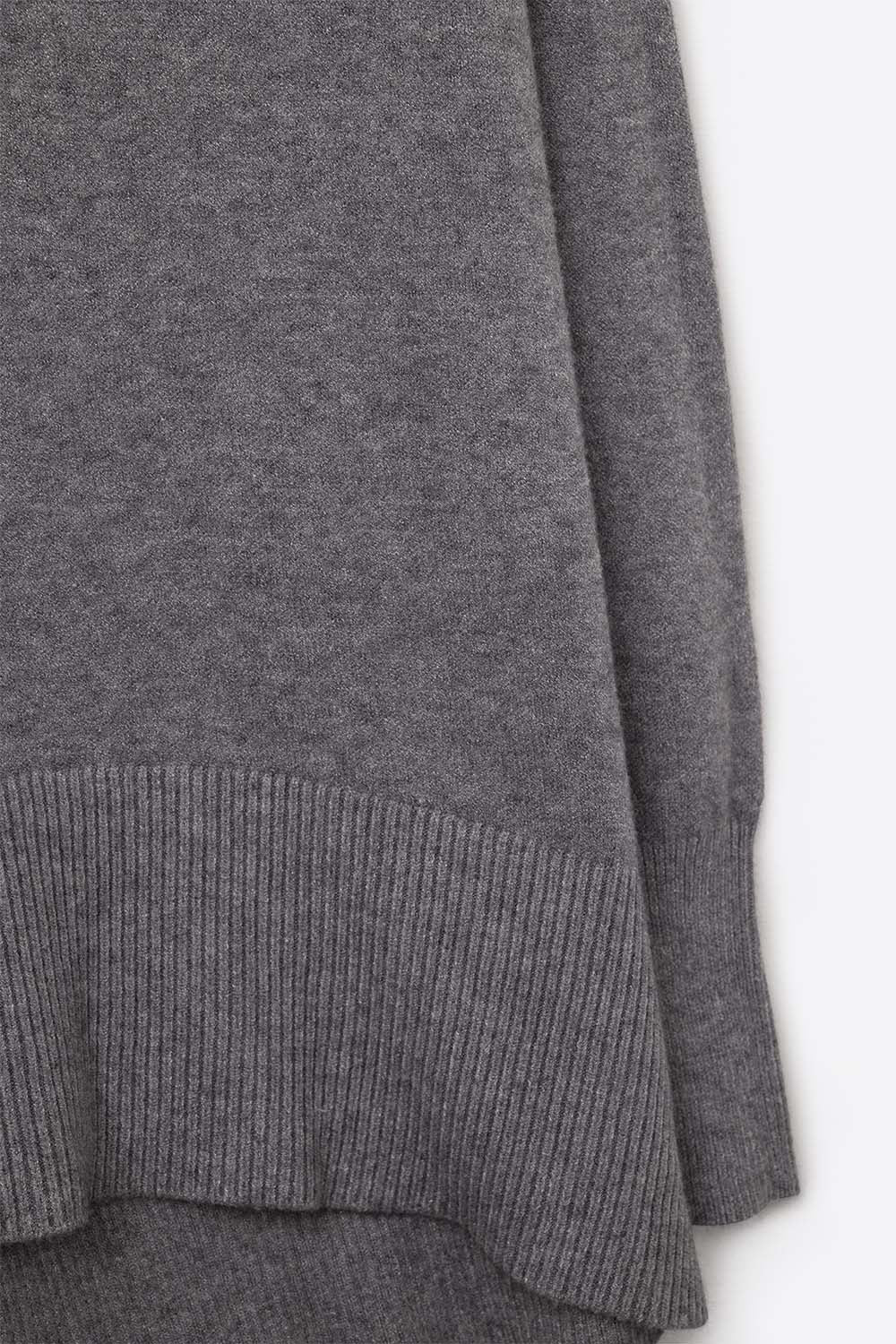 Loose gray sweater with open back detail
