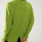 Loose green sweater with opening in the back