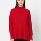 Loose red sweater with open back detail