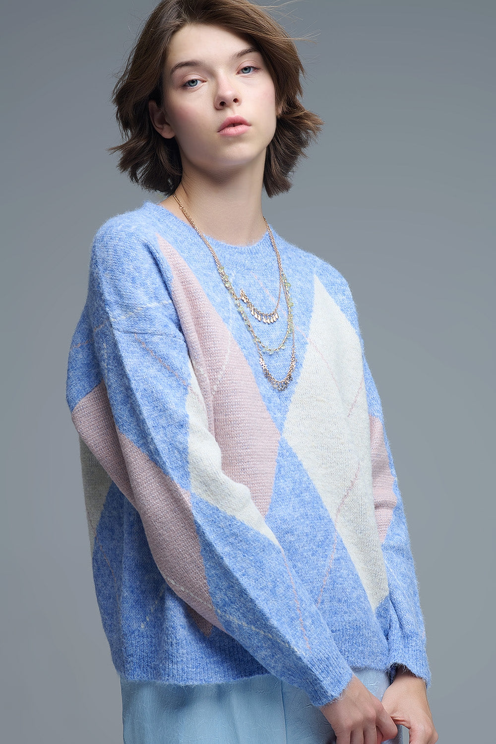 loose sweater in sky blue with diamond patterns