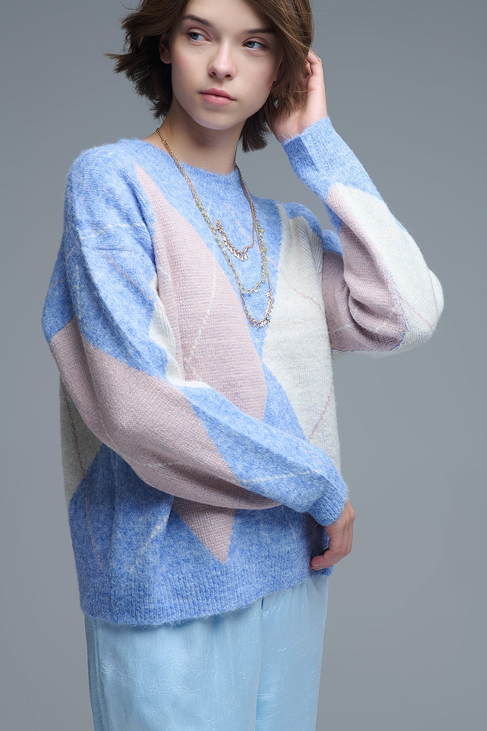loose sweater in sky blue with diamond patterns