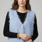 Luxurious vest with light blue long-haired texture