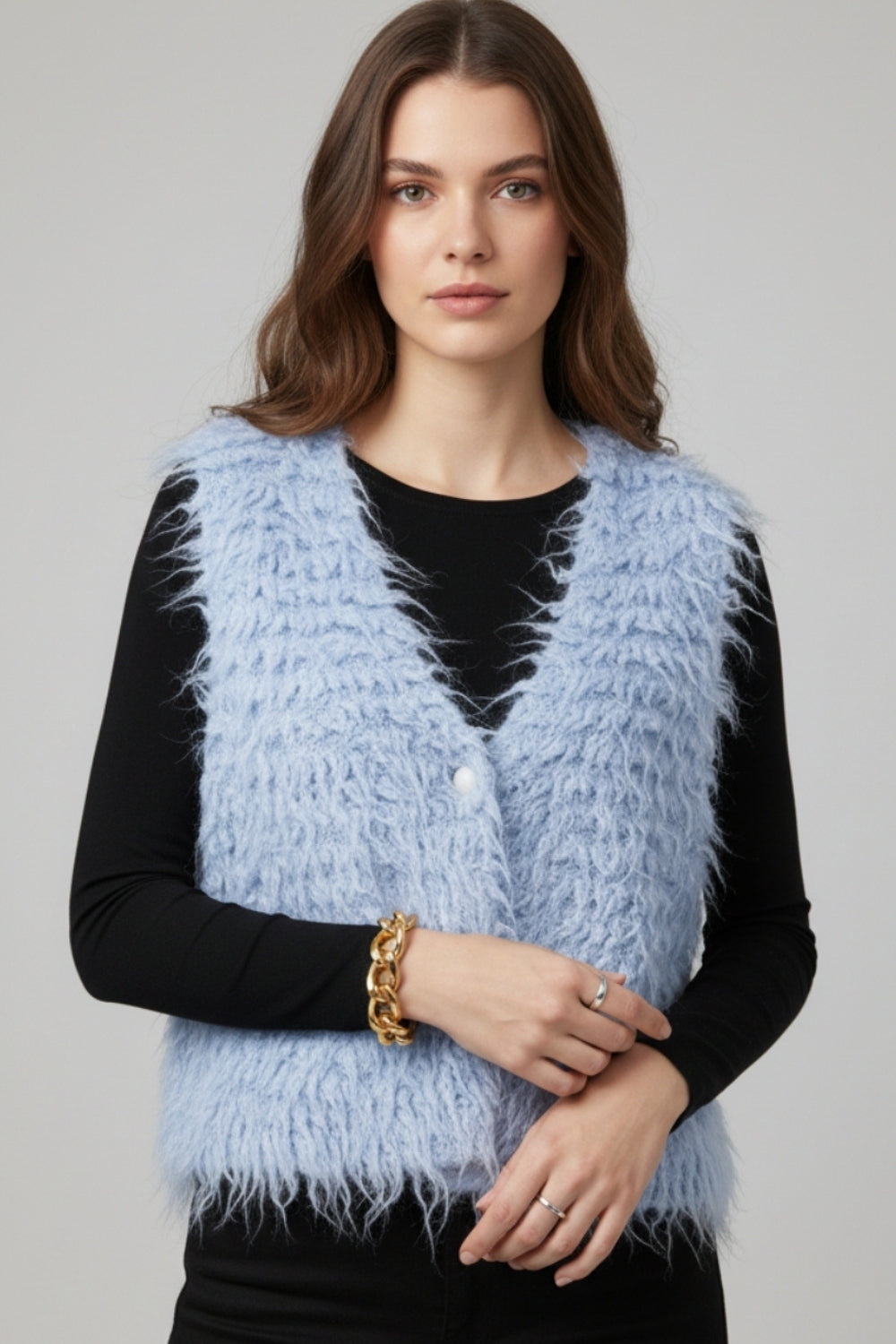Luxurious vest with light blue long-haired texture
