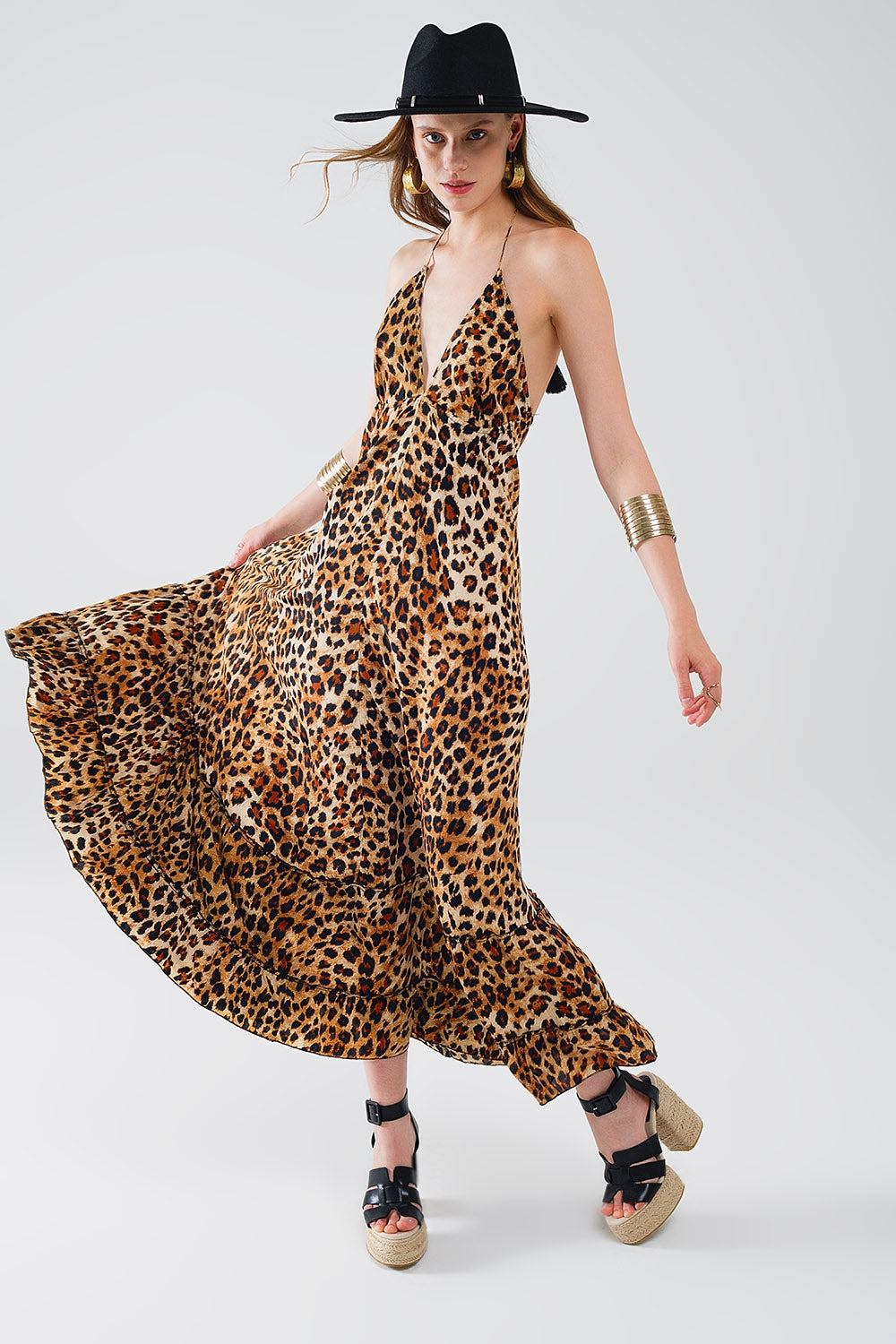 Vestido largo bohemio con estampado de leopardo y espalda abierta