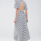 Maxi polka dot dress with open back detail