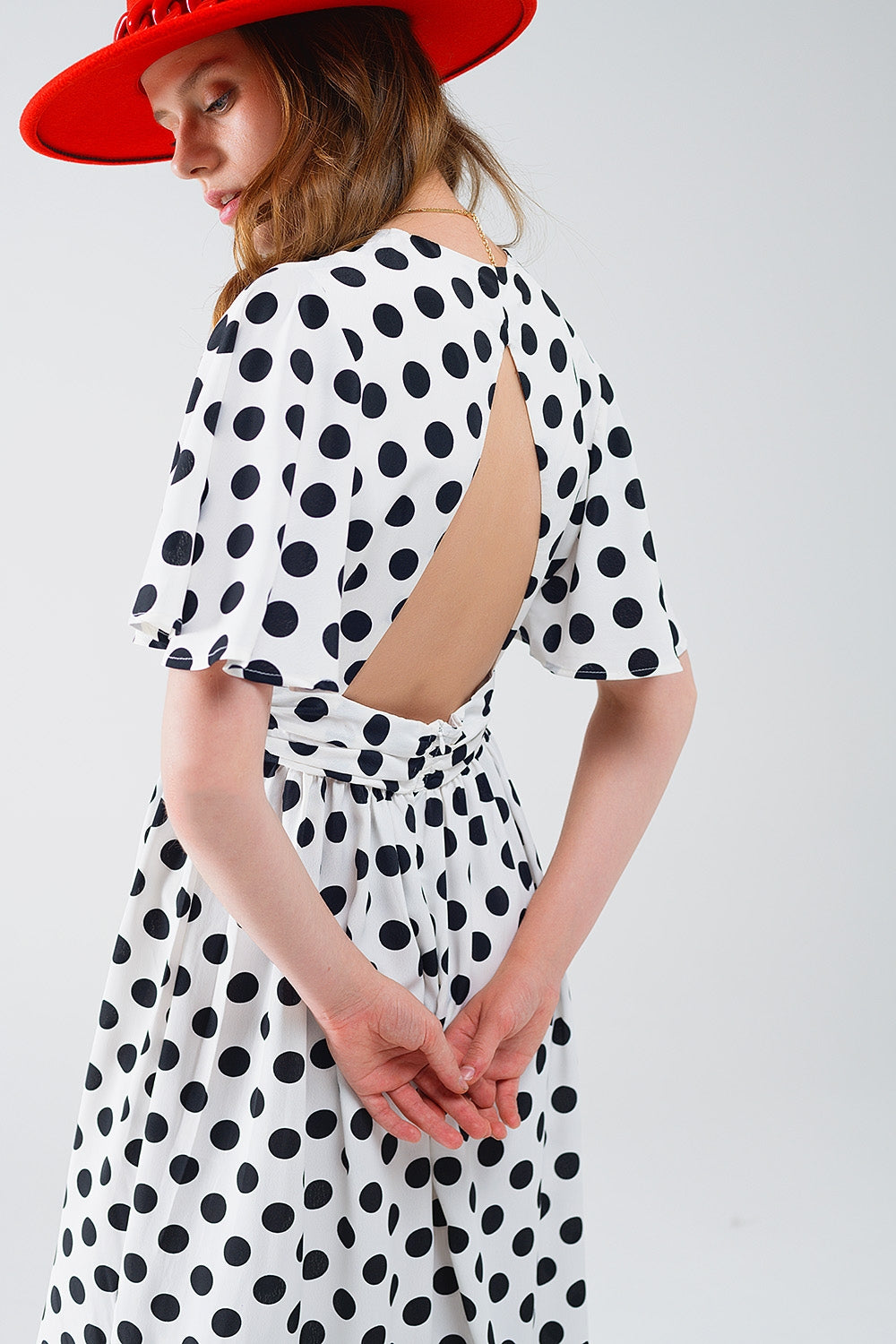 Maxi polka dot dress with open back detail