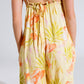 Maxi yellow jumpsuit in tropical print