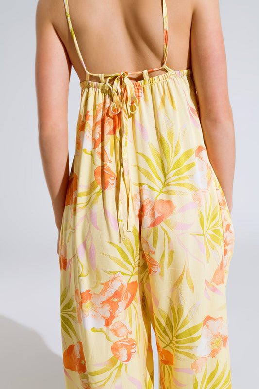 Mono maxi amarillo con estampado tropical