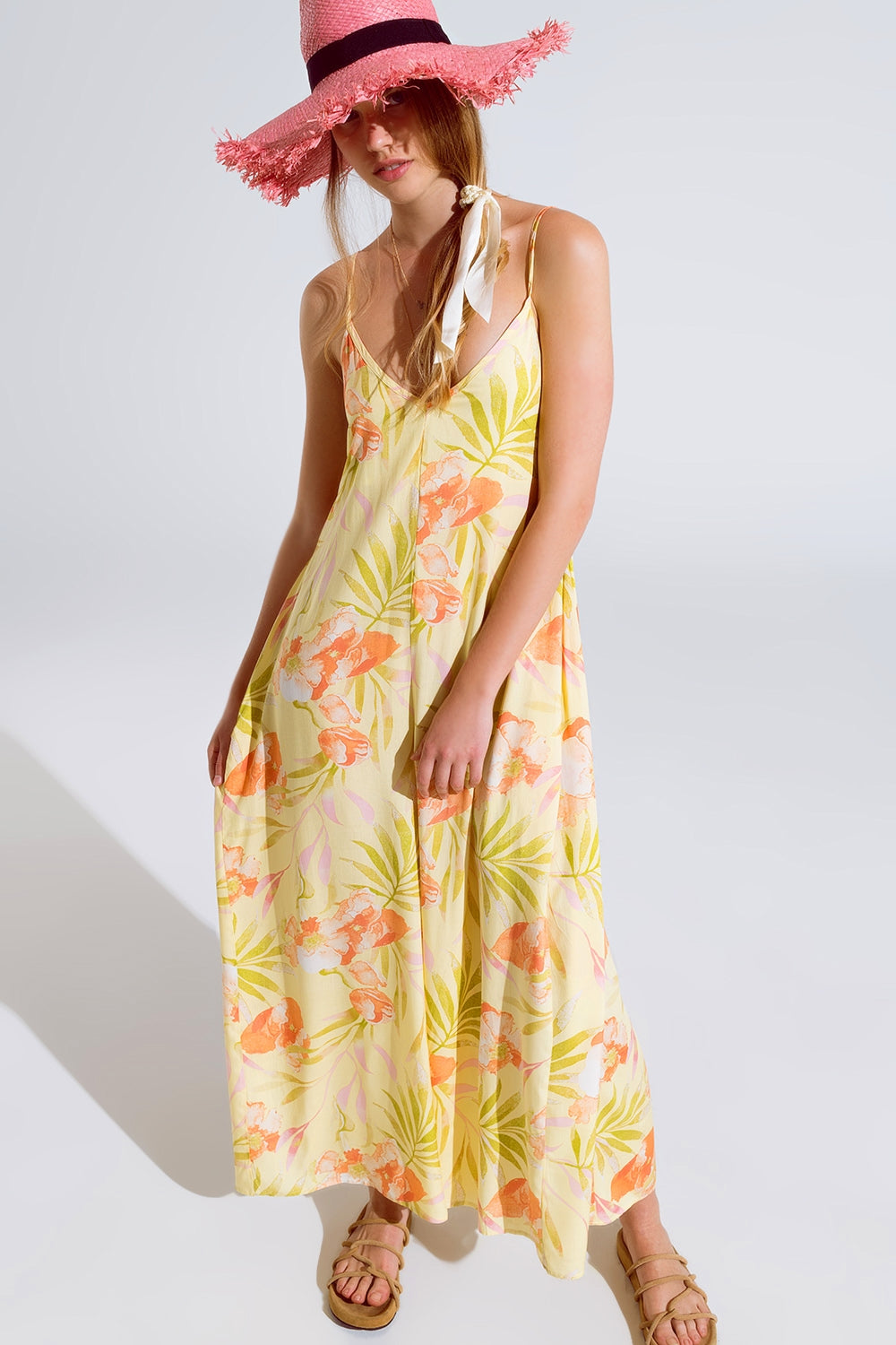 Maxi yellow jumpsuit in tropical print