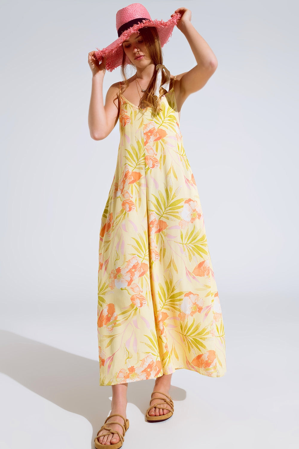 Maxi yellow jumpsuit in tropical print