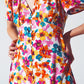 Vestido midi ceñido al puño con estampado floral multicolor