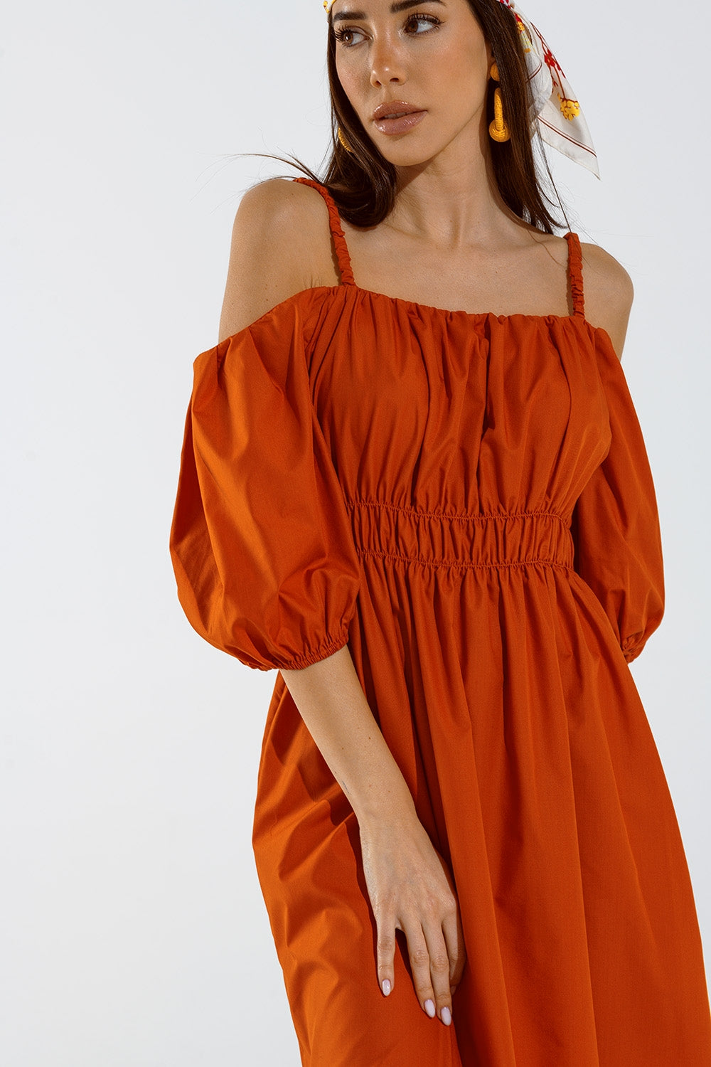 Midi orange dress with short sleeves and straps