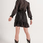 Mini dress with flippy hem in black