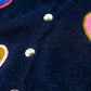 Navy blue knitted cardigan with embroidered hearts