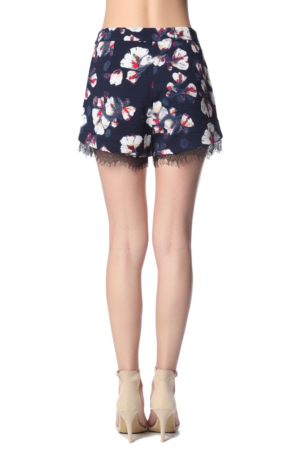 Navy blue shorts in floral print with lace detail