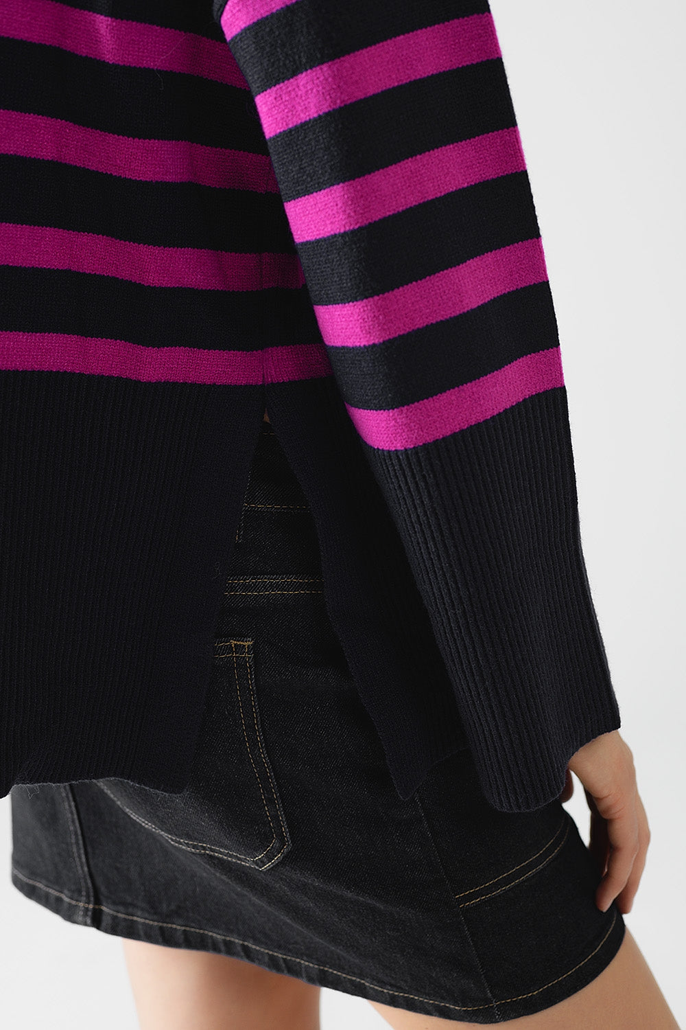 Navy oversized trutleneck sweater with fuchsia stripes and splits on the side