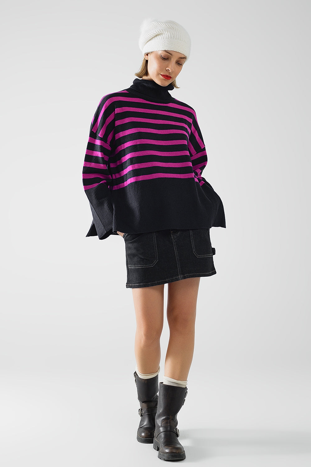 Navy oversized trutleneck sweater with fuchsia stripes and splits on the side