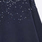 Navy soft knit sweater embellished with sequins on the front