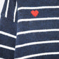 Navy striped knit sweater with red heart detail
