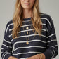 Navy striped knit sweater with red heart detail