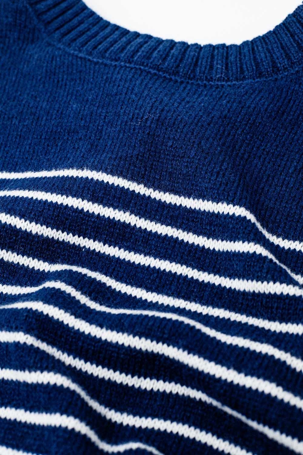 navy sweater with white stripes and boat neck