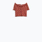 Off The Shoulder Cropped Knitted Top in Rust Melange