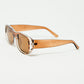 Oval Sunglasses with High Gloss Transparent Camel Frames