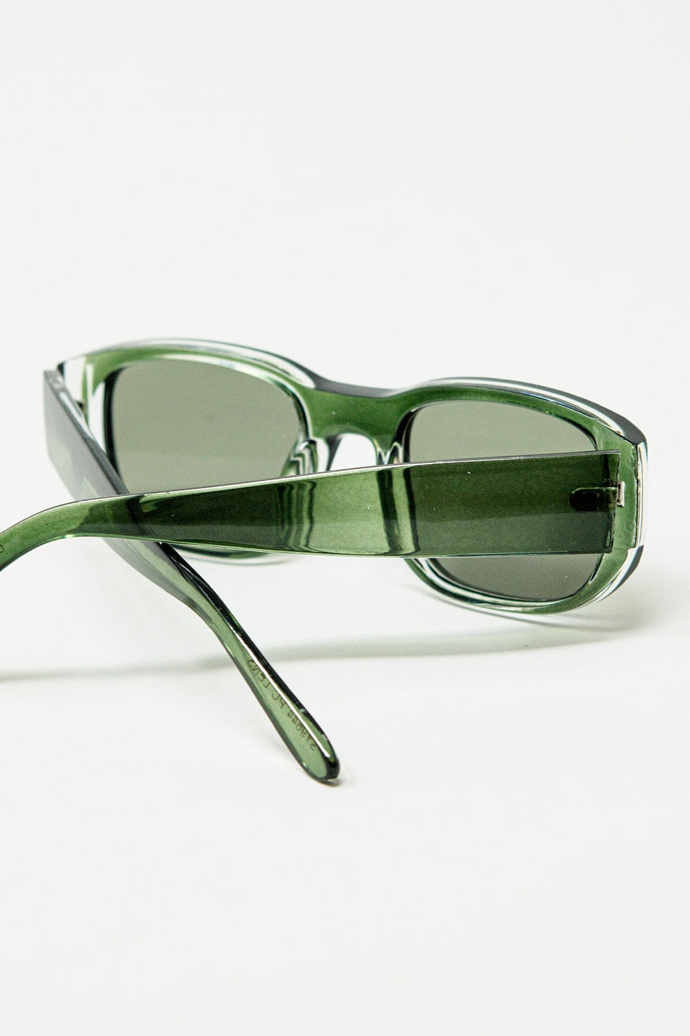 Oval Sunglasses with High Gloss Transparent Frames in green