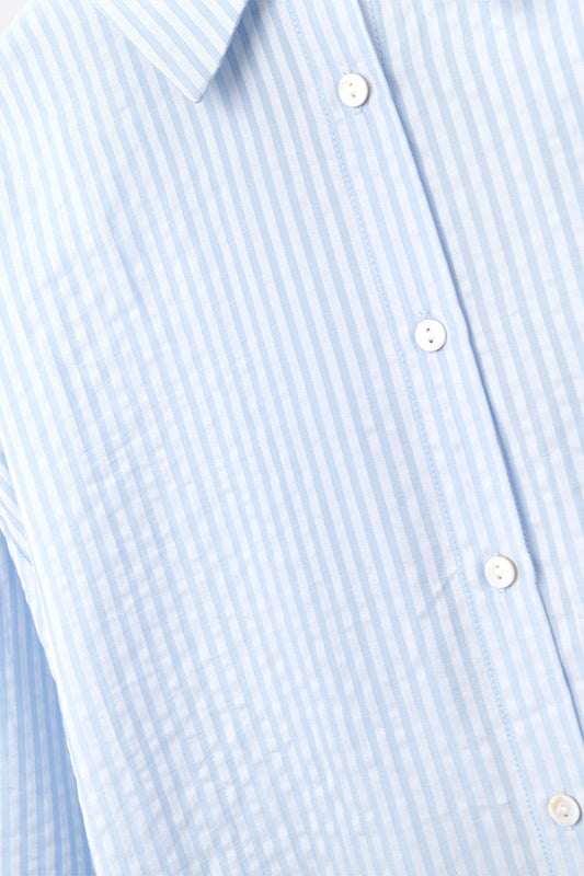 oversized baby blue shirt with bow in the back