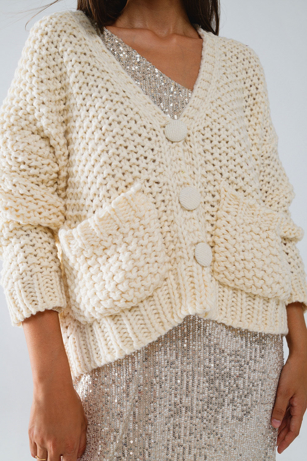 Oversized beige chunky knit jacket with pockets