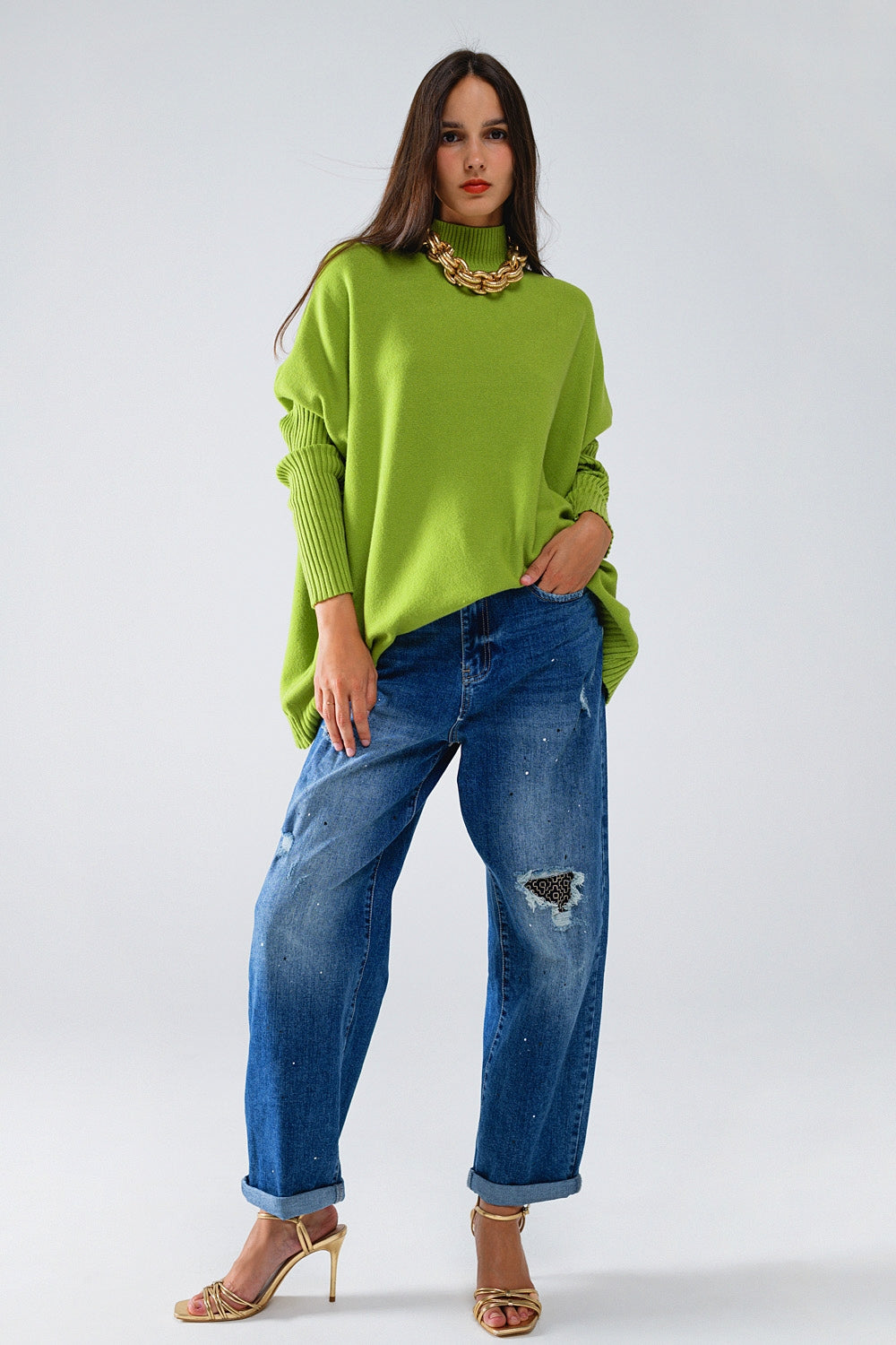 oversized cozy green sweater with ribbed sleeves