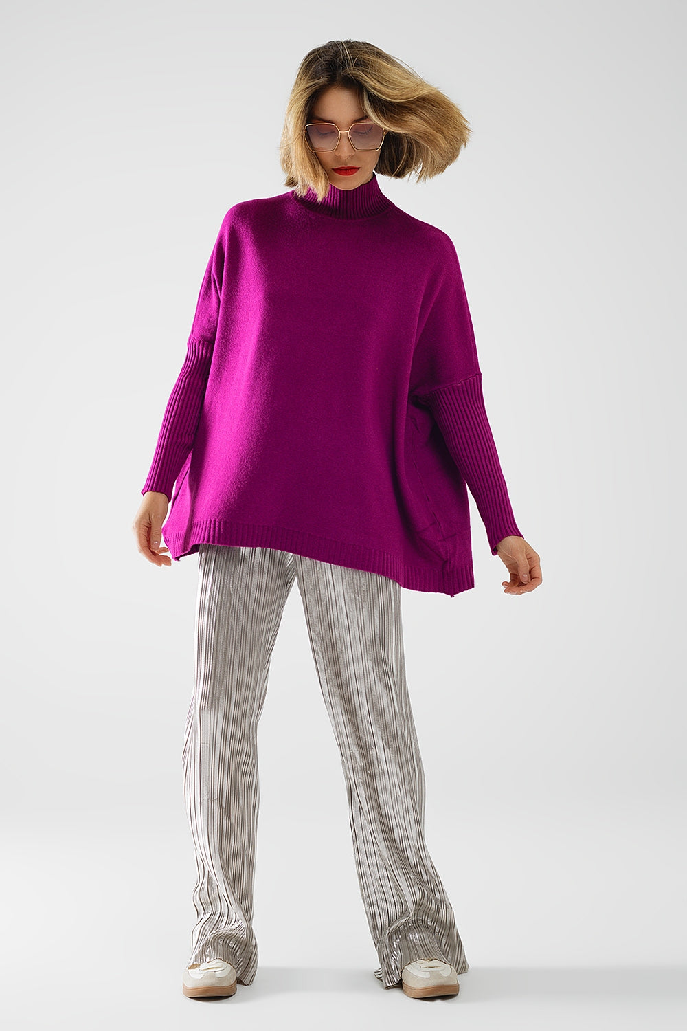 oversized soft fuchsia sweater with ribbed sleeves