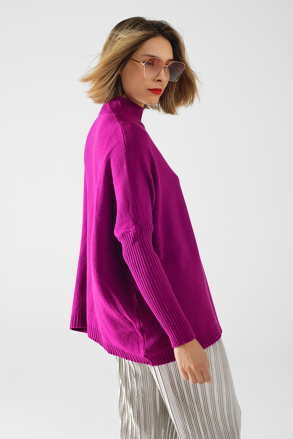 oversized soft fuchsia sweater with ribbed sleeves