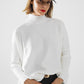 oversized soft knitted white sweater with ribbed sleeves