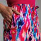 Pantalones estilo palazzo con estampado abstracto rosa y azul