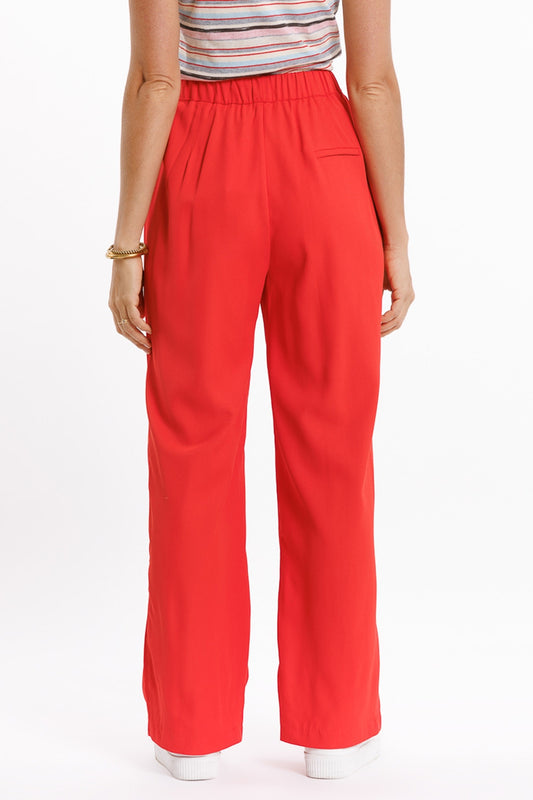 Pants In Coral With Front Pockets And Drawstring Closing