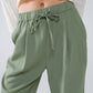 Pants In Green With Front Pockets And Drawstring Closing