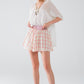 Pink Checkered print shorts with tight-fitting waist detail