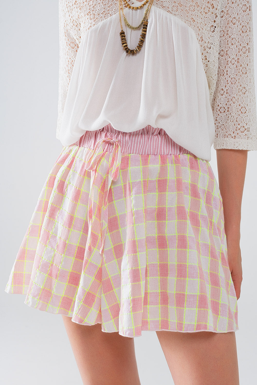 Pink Checkered print shorts with tight-fitting waist detail