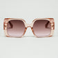 Q2 Pink square sunglasses with gold detail on the side