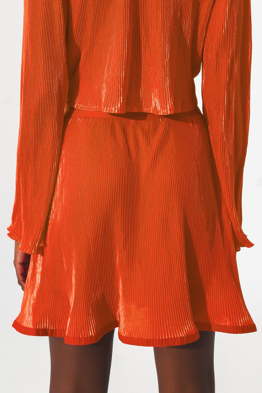 Pleated short skirt in orange