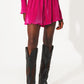 Pleated shorts in fuschia