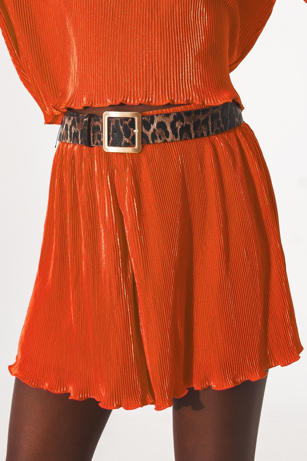 Pleated shorts in orange