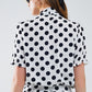 Polka dot blouse with scarf tie detail