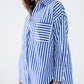 Poplin shirt with vertical stripes in blue and chest pocket